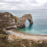 Скалистая арка Durdle Door, побережье Юрского периода Скалистая арка Durdle Door, побережье Юрского периода
